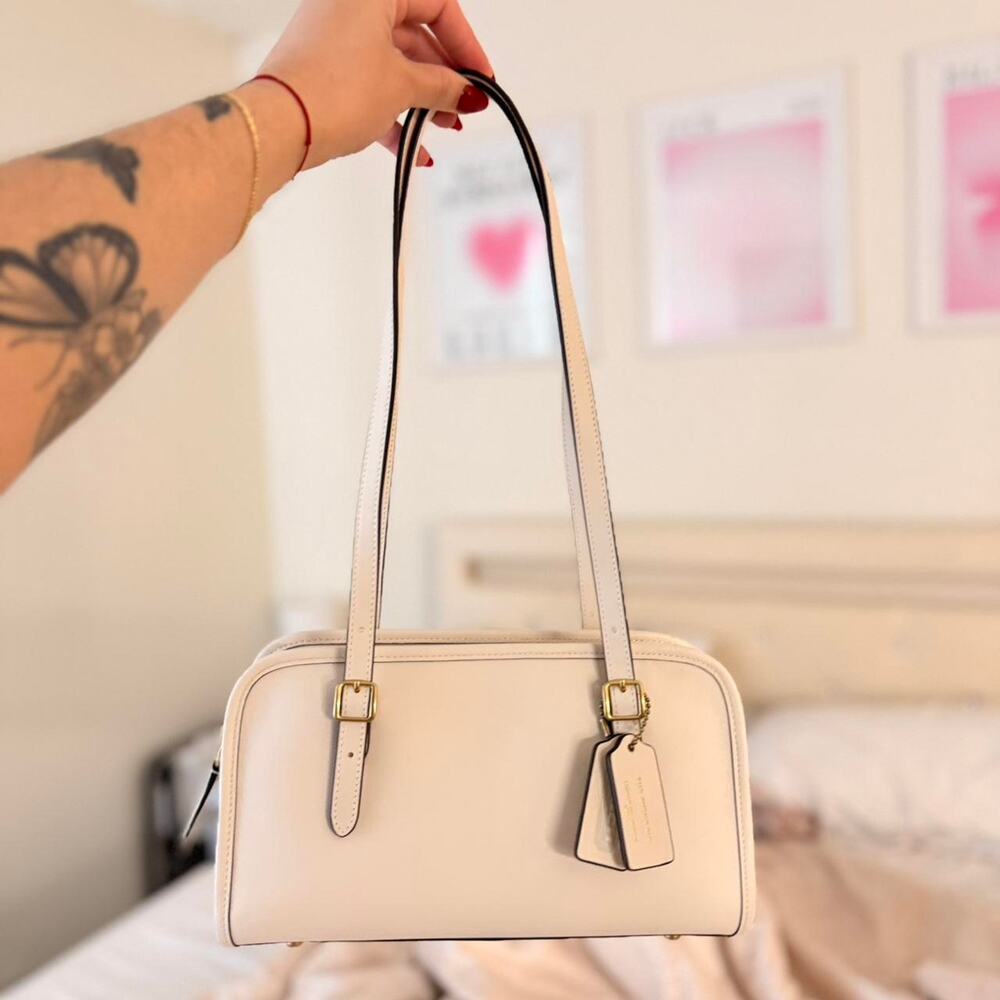 Nwt coach swing zip bag